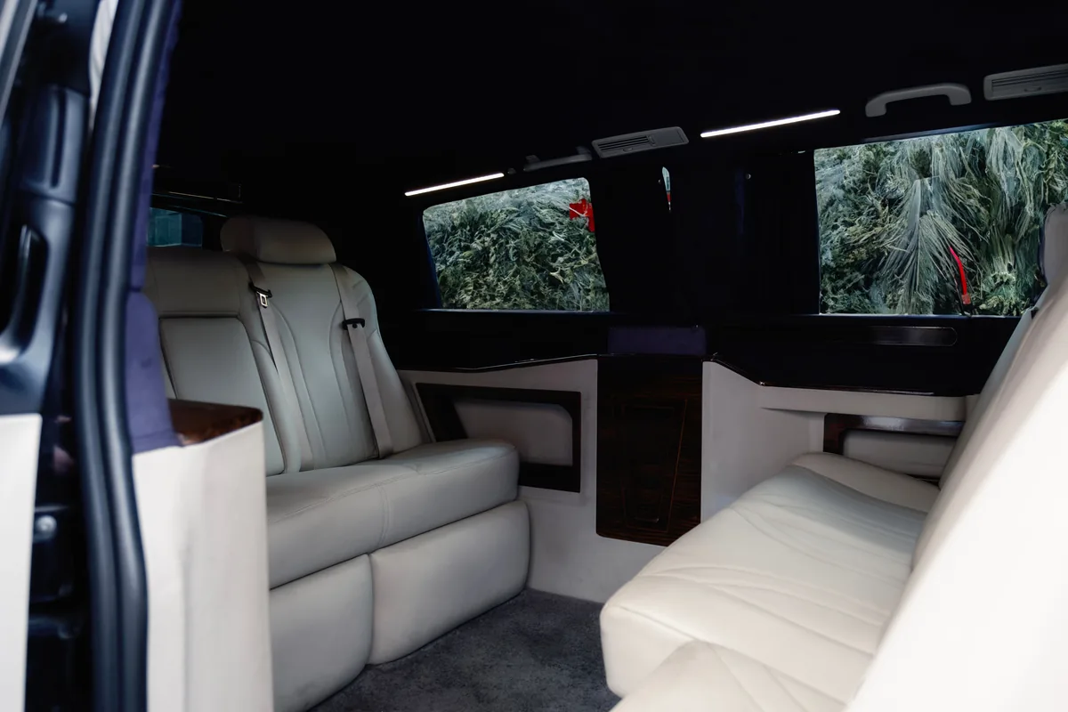 Upholstered passenger seats inside a van